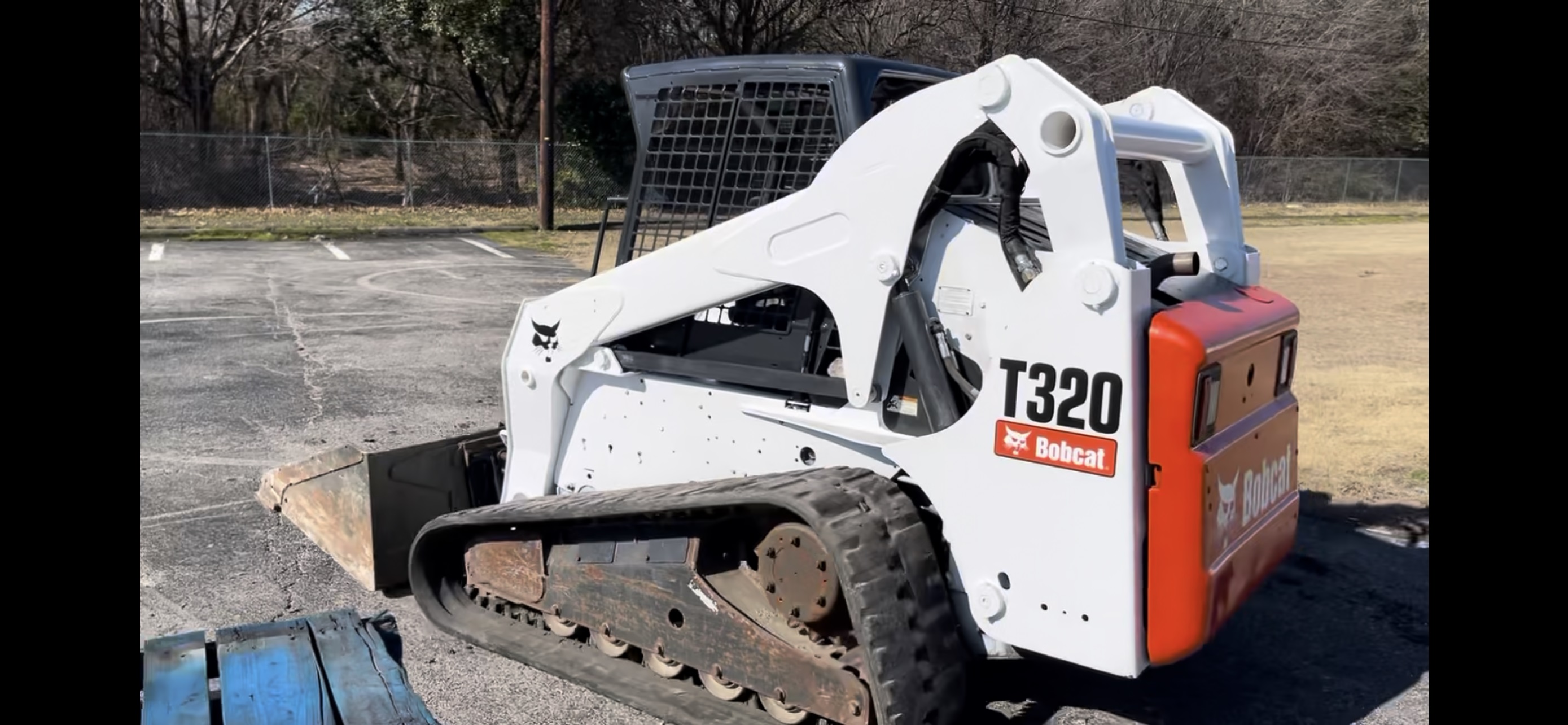 Skid-steer working in the field